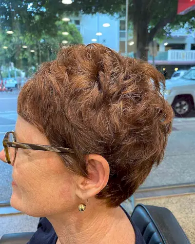 Modern Layered Pixie Crop with Micro Bangs for women aged 60 with pair of glasses