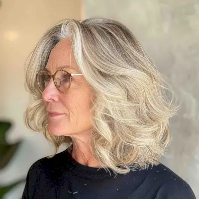 Beige blonde hair color with glasses for 50-year-olds