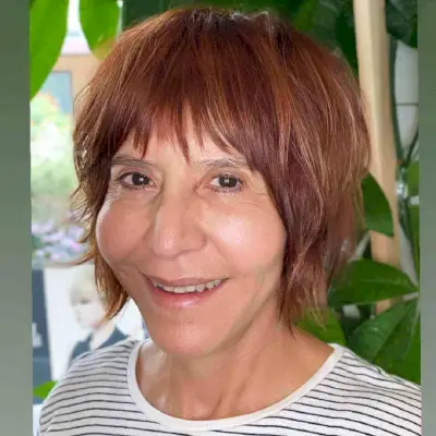 Layered Bob Cut with Textured Bangs Over 50