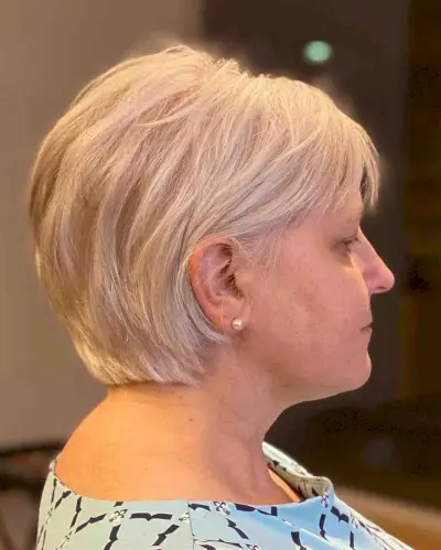 Concave Bixie Haircut with Subtle Layers for 50-Year-Old Women