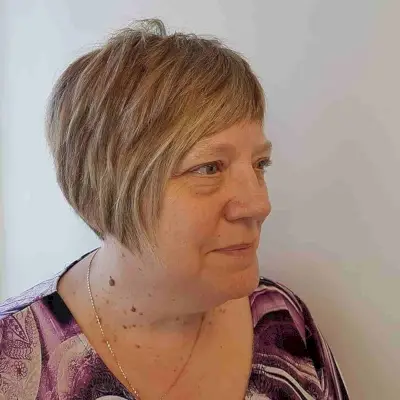 Choppy Pixie Bob with Short Bangs for a 50-Year-Old Woman