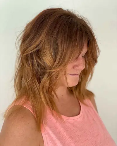 Edgy Shag for Women Over 40 with Round Faces