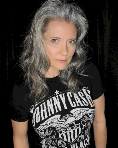 Mid length wavy hair for women over 60 with grey hair