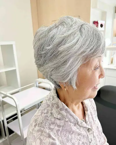 Volume and Texture in a Short Haircut for Ladies Aged 60 with Grey Hair