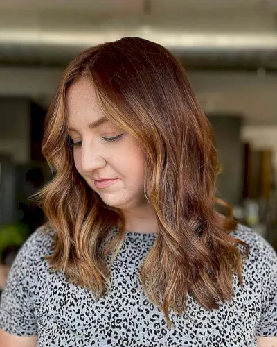 Fall Mid-Length Cut with Warm Auburn and Face-Framing Highlights for Women Over Forty