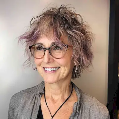 Edgy Layered Haircut for Thin Haired Women Over 50 with Glasses