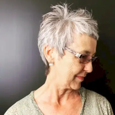 Mature Short Grey Pixie Cut for women over 50 with glasses and fun frames