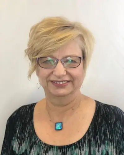 Sexy Short Bob with Side Part for 50-Year-Olds who wear glasses