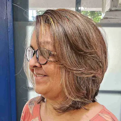 Butterfly Short Hair with Side Bangs on Women with Fuller Faces