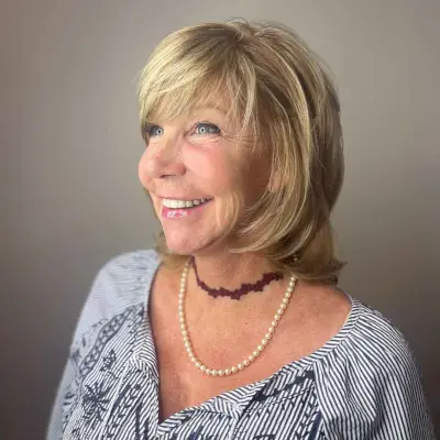 Layered Face-Framing Cut with Bangs