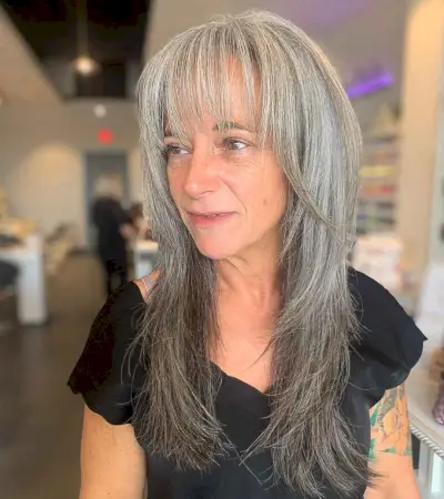 Long Shaggy Hair with Long Bangs for ladies in their 60s