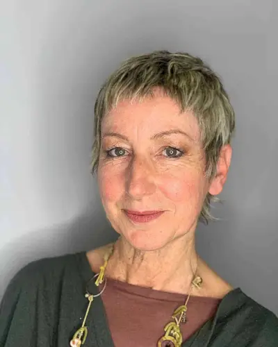 Extra Short Wolf Cut for 60-Year-Olds with Fine Hair and very short bangs
