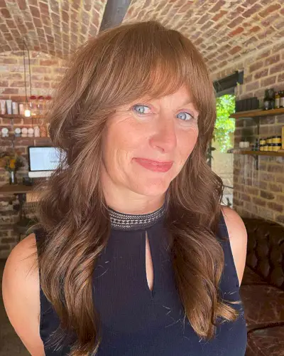 Chest-Length Wavy Wolf Shag with Soft Bangs for Mature Ladies Aged 50