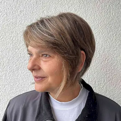 Short and Shaggy Bob with Side-Swept Bangs