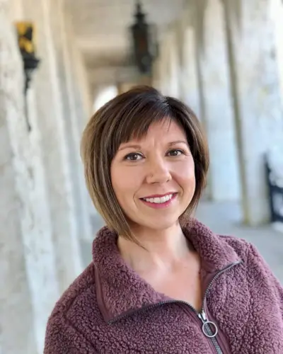 short bob with asymmetrical bangs for over 50 with round face