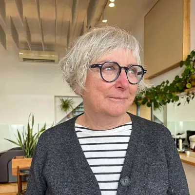 choppy silver bob for ladies over 50 with a round face