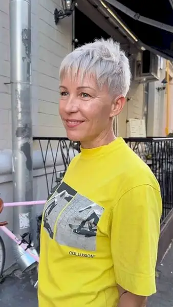 Alluring White Pixie Cut with Fringe for 50-Year-Olds