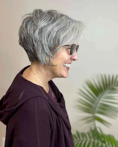 asymmetrical pixie for older ladies in their 50s with gray hair