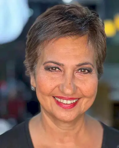 Short Brunette Pixie with a Side Part for Ladies Aged 50