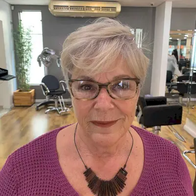 Silver Pixie Cut with Bangs and Glasses
