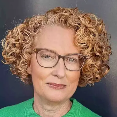Short Honey Curls for Older Women with Glasses