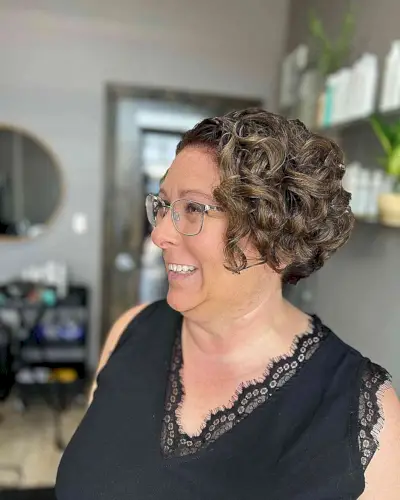 Cheek-Length Cropped Bob with Voluminous Curls for Mature Women