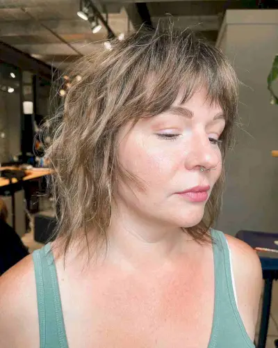 Undone Shaggy Bob with Short Bangs for Women at Their 40s