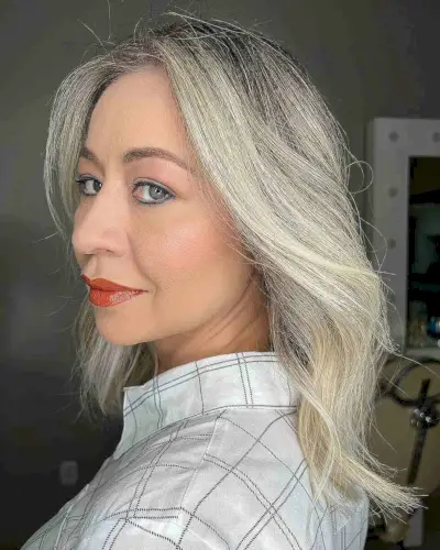Rooted Blonde Balayage on a Medium Haircut for Ladies Past 40