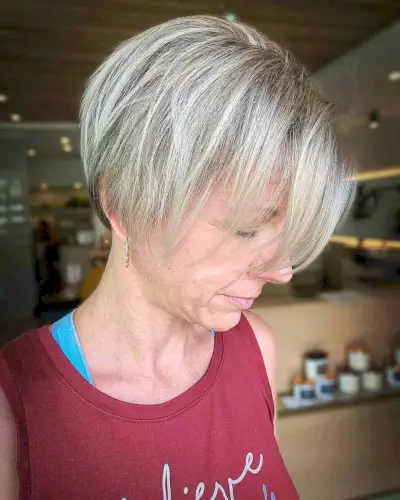Platinum Blonde on a Long Pixie Hair for Women in Their 40s
