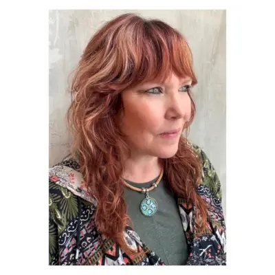 shag with curtain bangs for women 60+