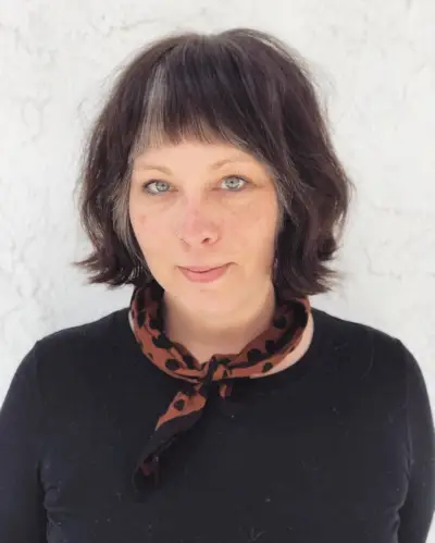 mid-length shag cut for thin hair and a round face for older women