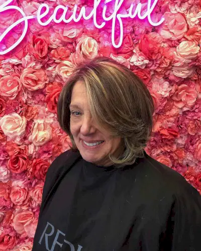 Long Graduated Bob with Feathered Layers for a Woman Over Sixty