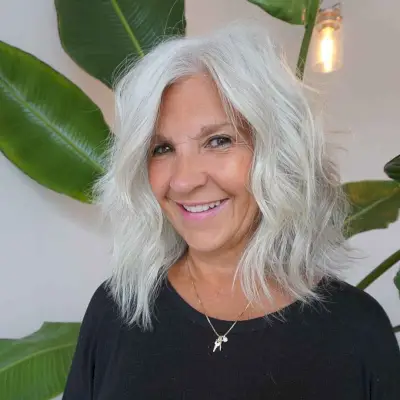 Edgy Messy Lob for Senior Ladies Over 60 with a Wavy Hair