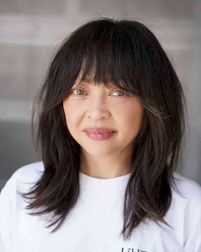 Eye-Grazing Fringe on a Mid-Length Cut for Ladies Aged 40 with fine hair