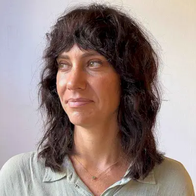 Shoulder-Length Shag with Curtain Bangs