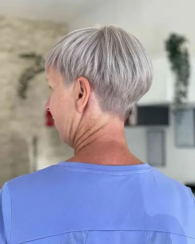 Short Glossy Grey Pixie Hair on Mature Women