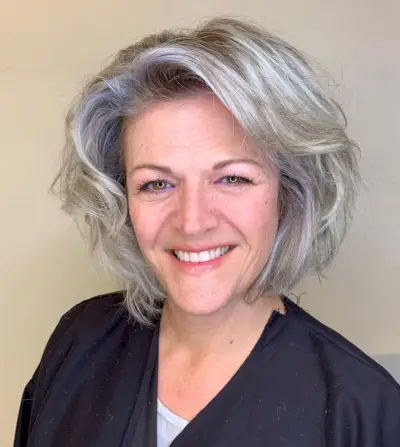 Short thick wavy hairstyle for older women