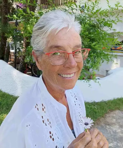 Short Swept-Back Pixie Hairstyle for an Old Woman