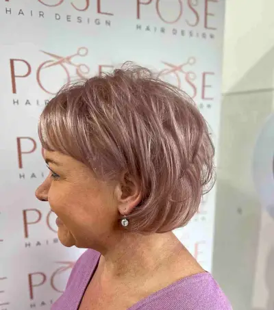 Short Pastel Hair with Feathered Layers and a Wispy Fringe for Old Ladies