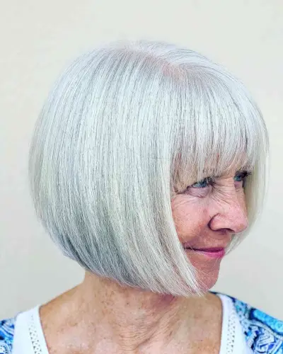 Chin-Length Bob Haircut with Full Bangs for Women Seventy and Over