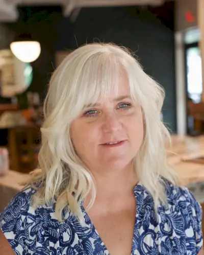 Shoulder-length textured cut for older women with round face shapes