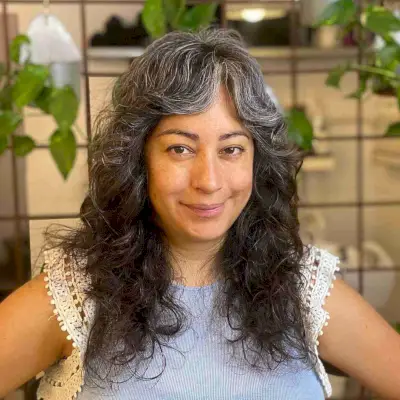 Greying Curly Shag for Women Past Fifty with Round Faces