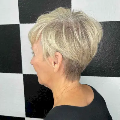 youthful pixie wedge haircut for women aged 60 plus