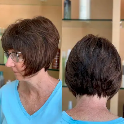 A lady over 60 with a sassy wedge hairstyle
