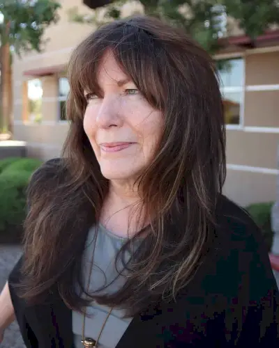 Long Shag with Face-Framing Layers for a lady over 60