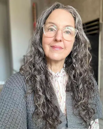 Layered Cut for Very Long Curls on Women Over Sixty with Glasses
