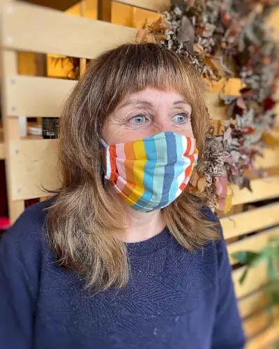 Feathered Shag with Short Bangs for Women Aged 60