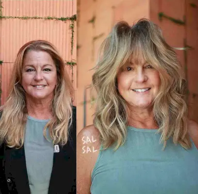 Fluffy Full Bangs on a Medium-Length Shag for Women Over Sixty