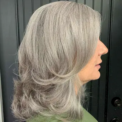 Mid-Length Cut with Feathered Layers for women past 60