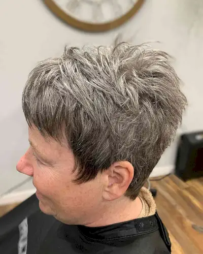 Short Choppy Tapered Pixie with Short Bangs for Older Women Aged 60 with Grey Hair